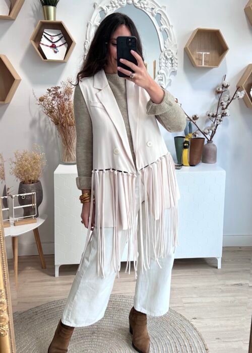Chaleco beige con flecos